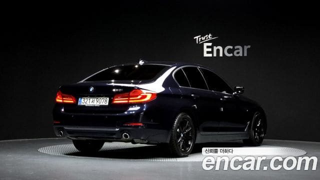 BMW 5 Series — фото 1
