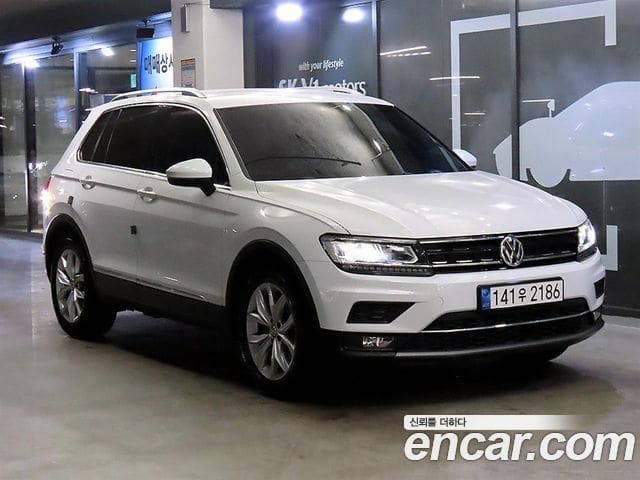 Volkswagen Tiguan — фото 1