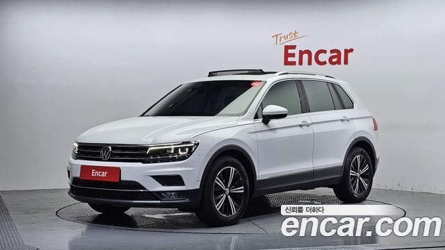 Volkswagen Tiguan — фото 1