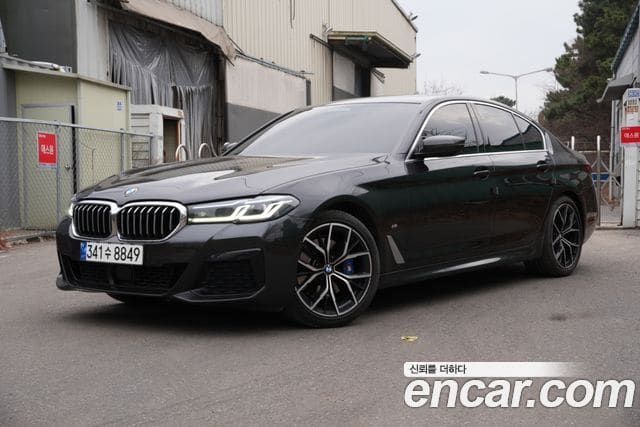 BMW 5 Series — фото 1