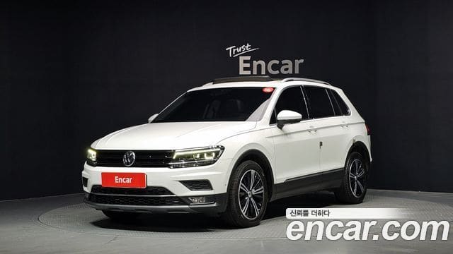 Volkswagen Tiguan — фото 1