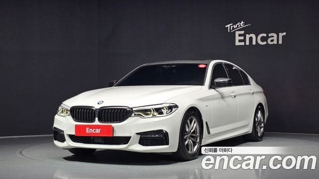 BMW 5 Series — фото 1