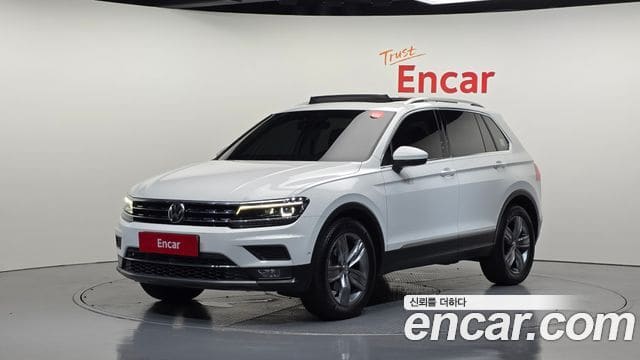 Volkswagen Tiguan — фото 1