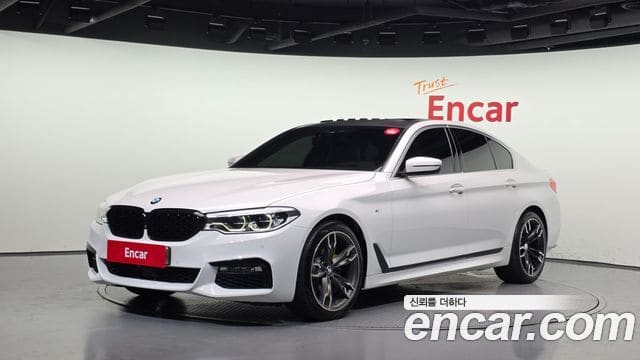 BMW 5 Series — фото 1