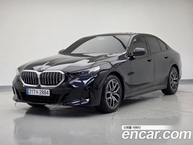 BMW 5 Series — фото 1