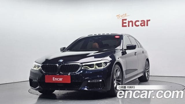 BMW 5 Series — фото 1