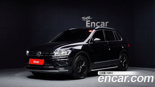 Volkswagen Tiguan — фото 1