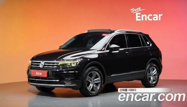 Volkswagen Tiguan — фото 1