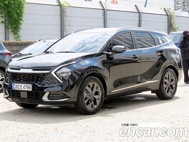 Kia Sportage — фото 1