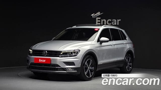 Volkswagen Tiguan — фото 1