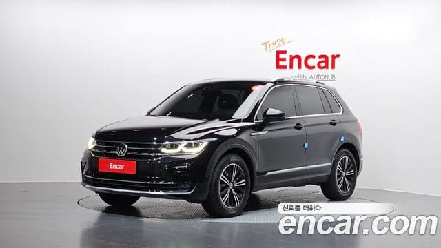 Volkswagen Tiguan — фото 1