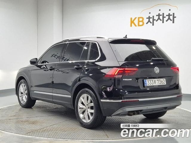 Volkswagen Tiguan — фото 1
