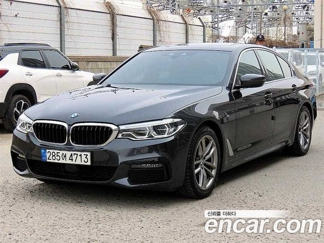 BMW 5 Series — фото 1