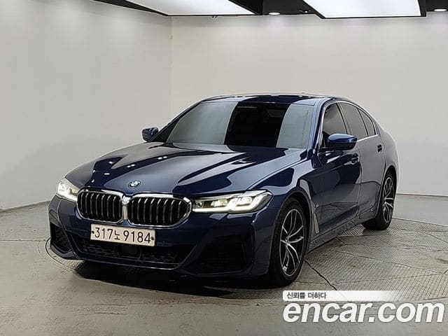 BMW 5 Series — фото 1