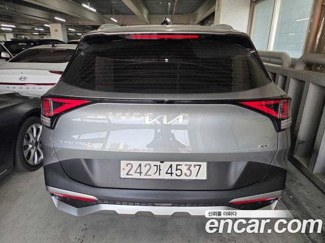 Kia Sportage — фото 1
