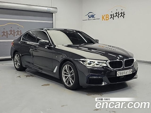 BMW 5 Series — фото 1