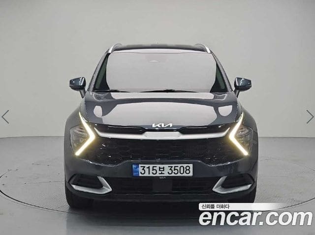 Kia Sportage — фото 1