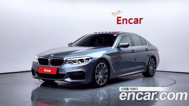 BMW 5 Series — фото 1