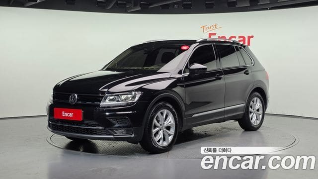 Volkswagen Tiguan — фото 1