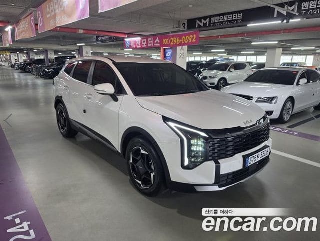 Kia Sportage — фото 1