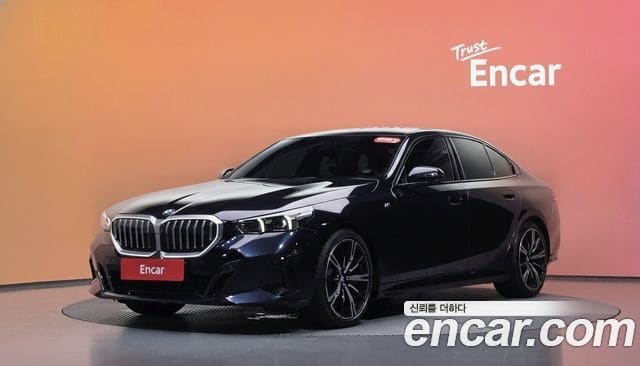 BMW 5 Series — фото 1