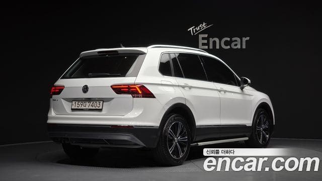 Volkswagen Tiguan — фото 1