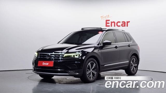 Volkswagen Tiguan — фото 1