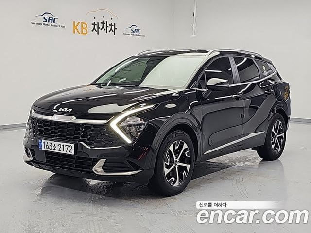 Kia Sportage — фото 1