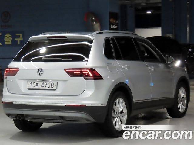 Volkswagen Tiguan — фото 1