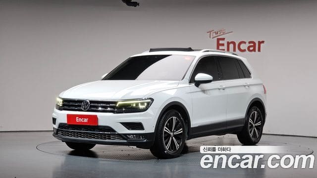 Volkswagen Tiguan — фото 1