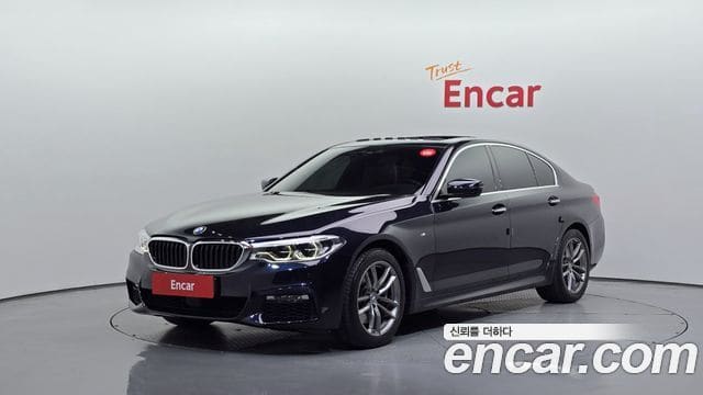BMW 5 Series — фото 1