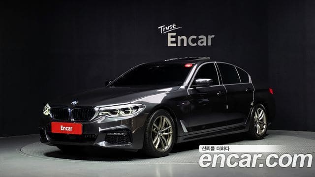BMW 5 Series — фото 1