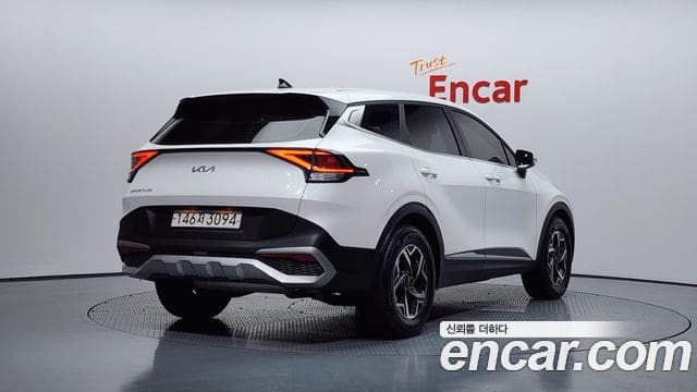 Kia Sportage — фото 1