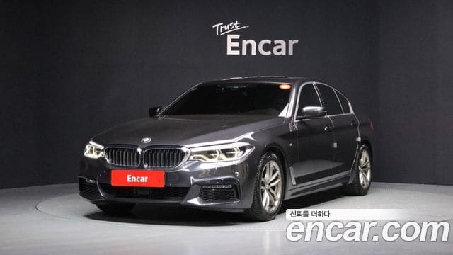 BMW 5 Series — фото 1