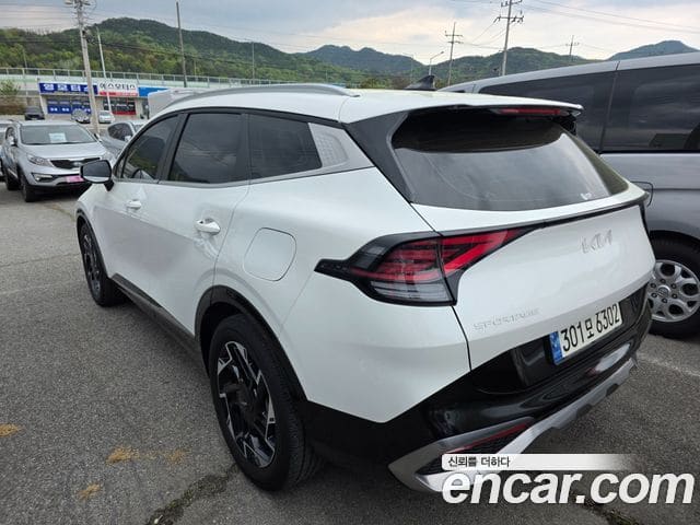 Kia Sportage — фото 1