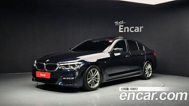 BMW 5 Series — фото 1