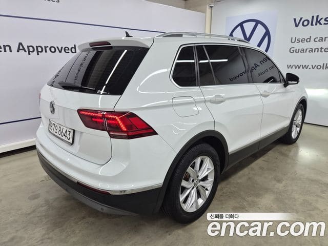 Volkswagen Tiguan — фото 1