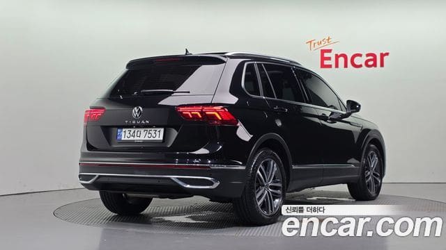 Volkswagen Tiguan — фото 1