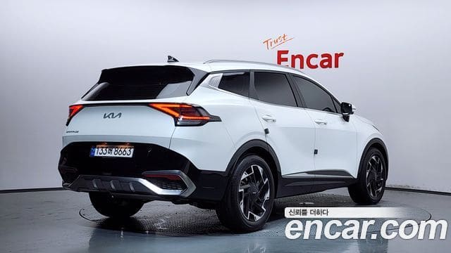 Kia Sportage — фото 1