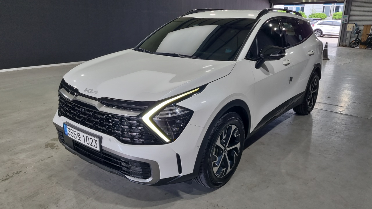 Kia Sportage — фото 1