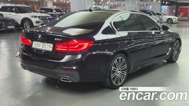 BMW 5 Series — фото 1