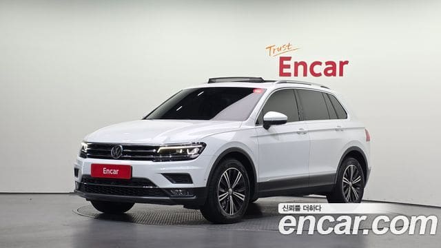 Volkswagen Tiguan — фото 1