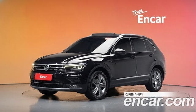 Volkswagen Tiguan — фото 1