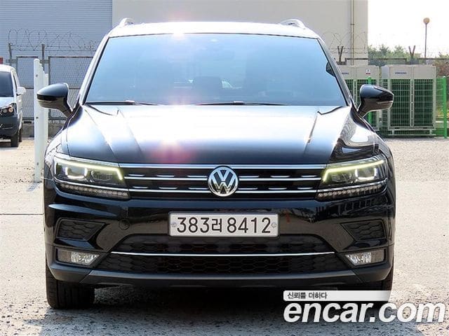 Volkswagen Tiguan — фото 1
