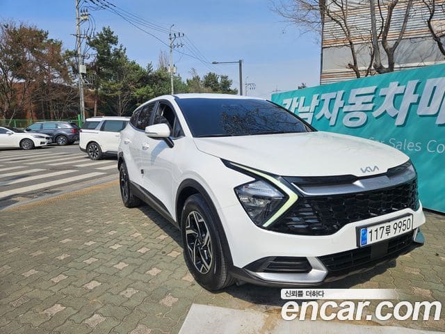 Kia Sportage — фото 1
