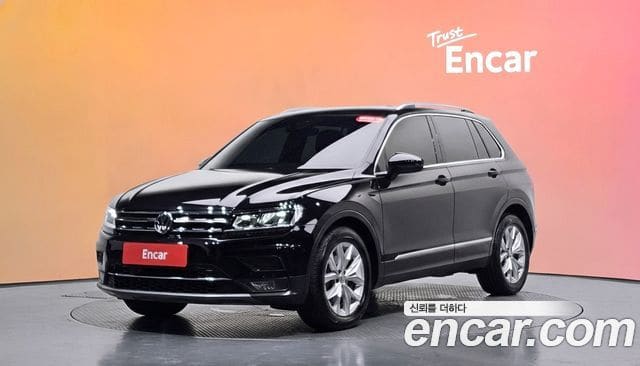 Volkswagen Tiguan — фото 1