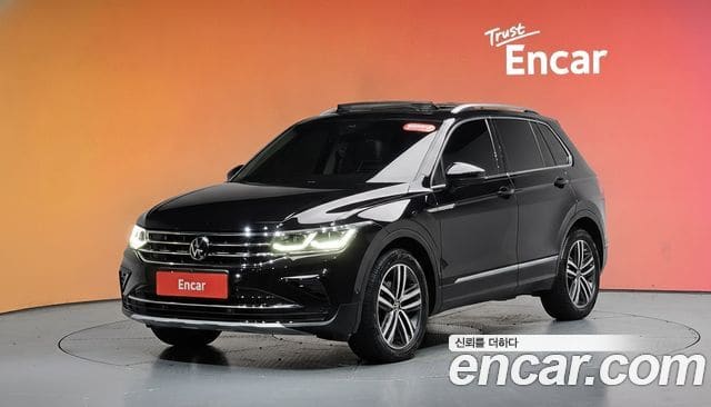Volkswagen Tiguan — фото 1