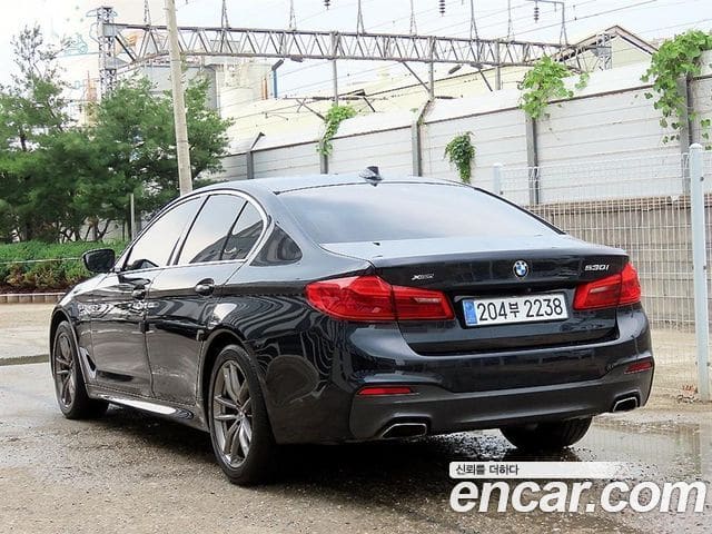 BMW 5 Series — фото 1