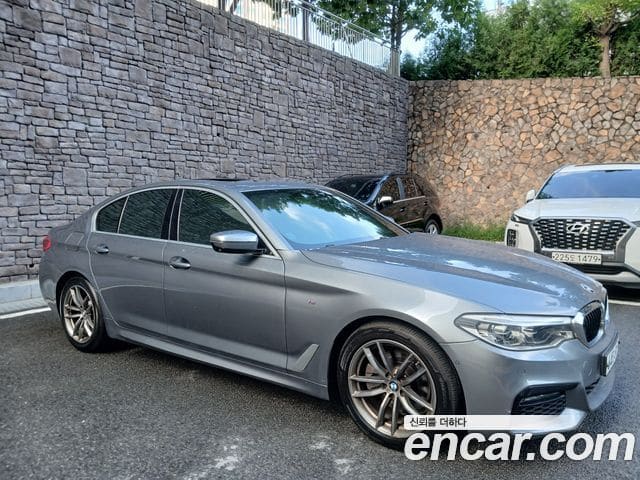 BMW 5 Series — фото 1