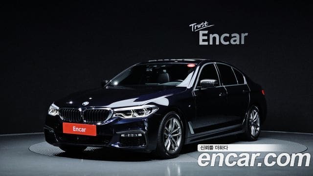 BMW 5 Series — фото 1